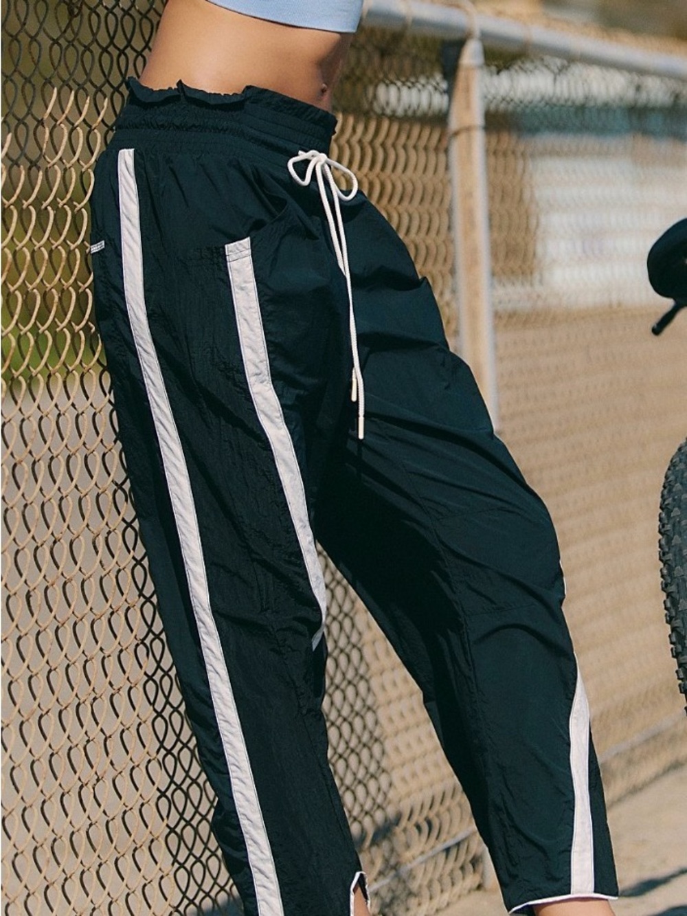 FP Movement ‘Champ is Here’ Black Track Pants with White Side Stripes - Picture 5 of 6
